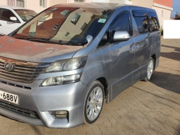 Toyota Vellfire year 2008 model fully loaded silver color 8 seater