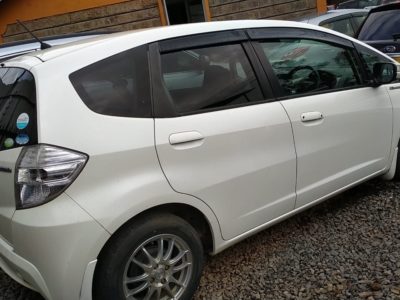 Honda Fit Hybrid year 2012 KCY pearl white color not used locally