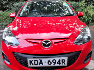 Shiny red clean Mazda Demio!