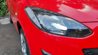 Shiny red clean Mazda Demio!